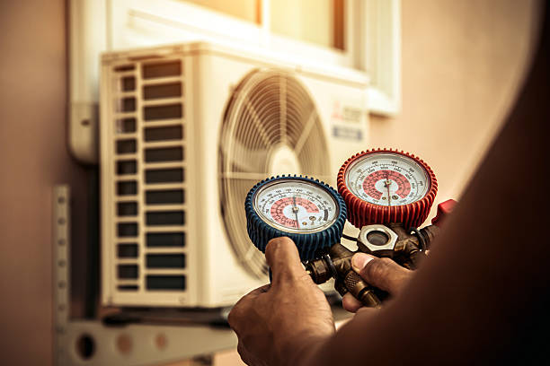 Professional Heat Pump Repair technician working in La Fayette, NY